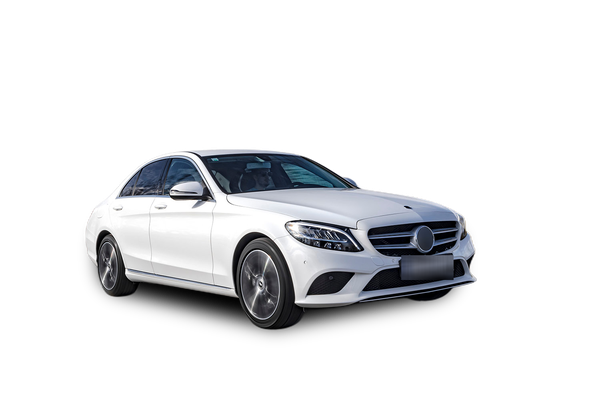 The same sedan cut out on a transparent background, with a drop shadow and the license plate hidden